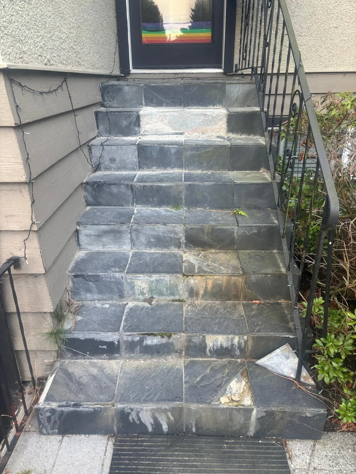 Front steps before: cracked slate tiles